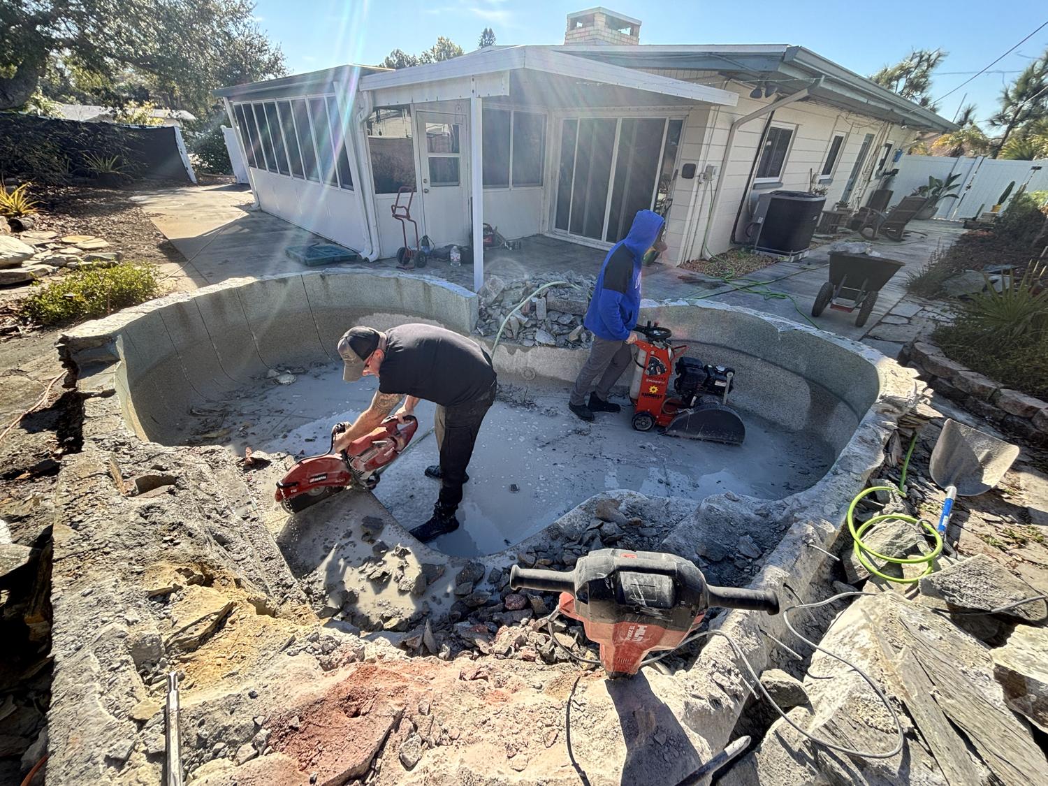 Pool demolition and removal by the Griffin Demolition crew in Tampa Bay